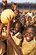 A blur of fun! Happy children playing football in their school break, Ghana